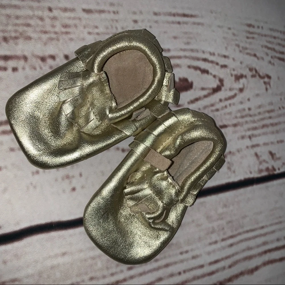 Gold moccasins 6-12 months